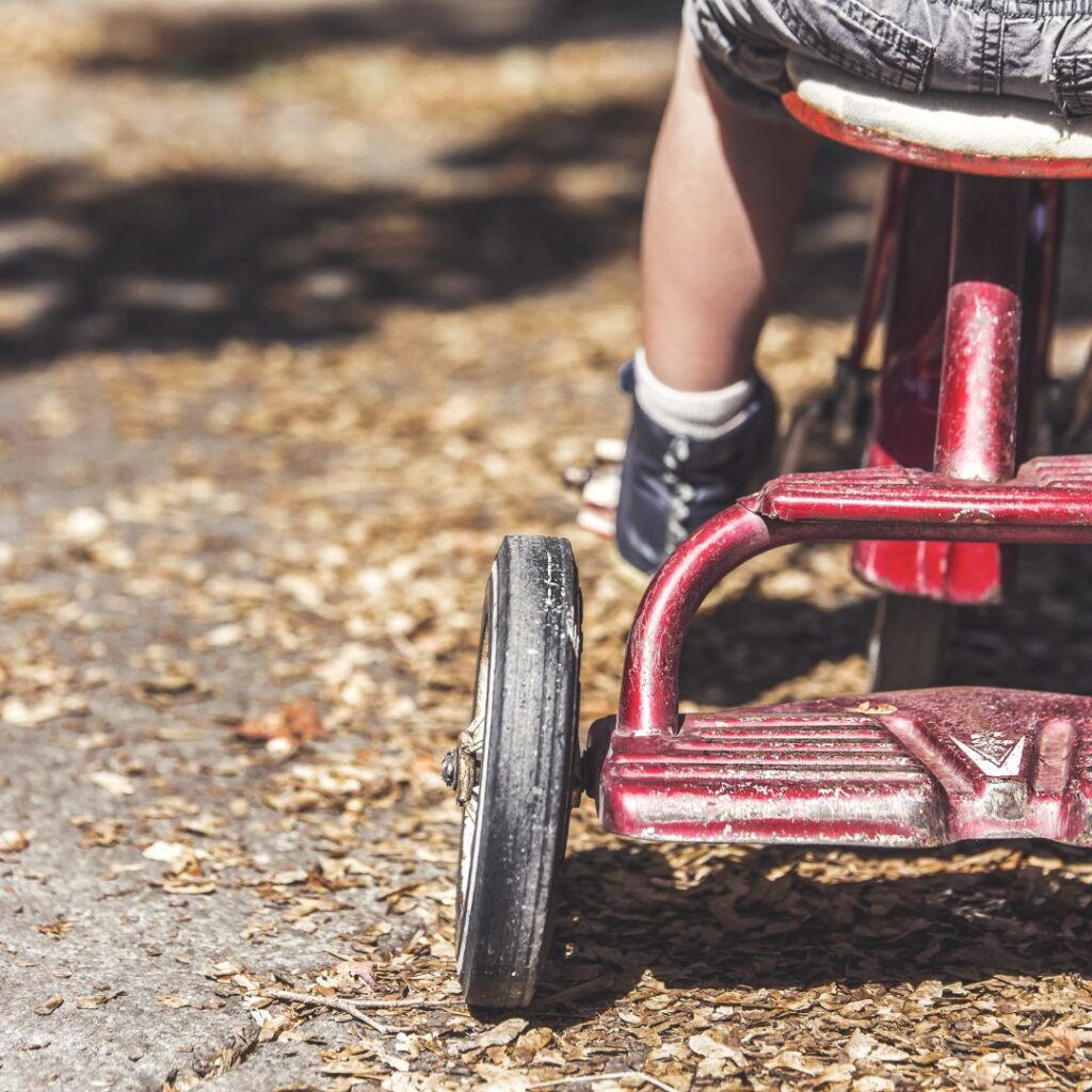 Riding kids tricycle